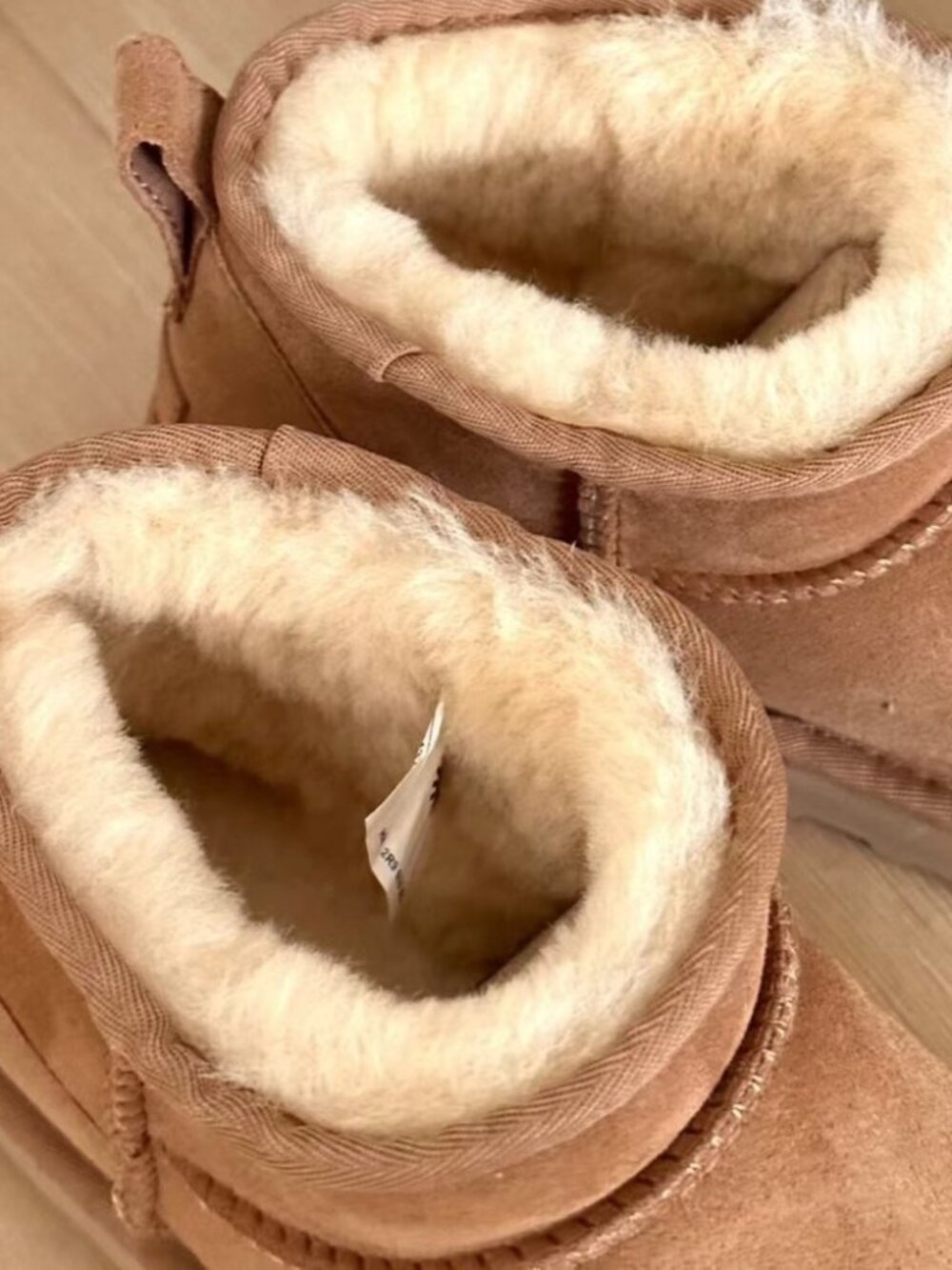 UGG Mini Booties in Chestnut Tan - Picture 6 of 7